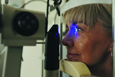 A patient having a post-operative exam after glaucoma surgery.
