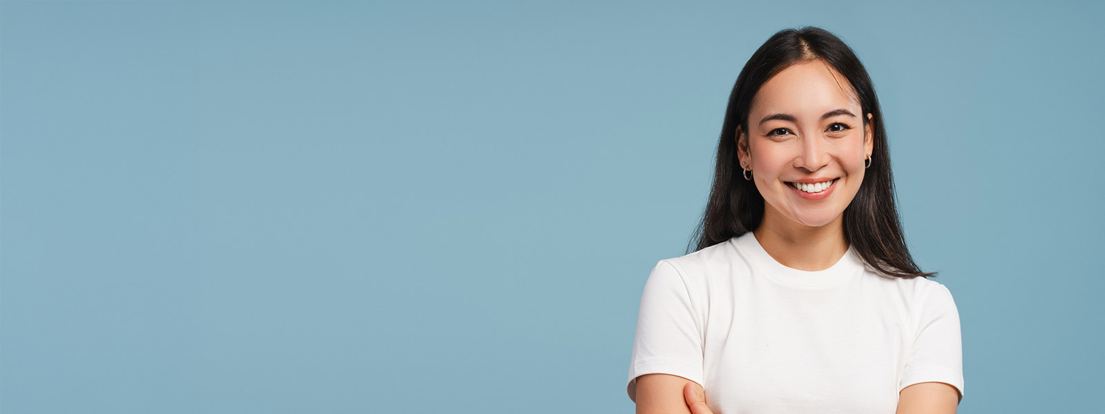 Smiling woman considering vision correction after taking a LASIK quiz